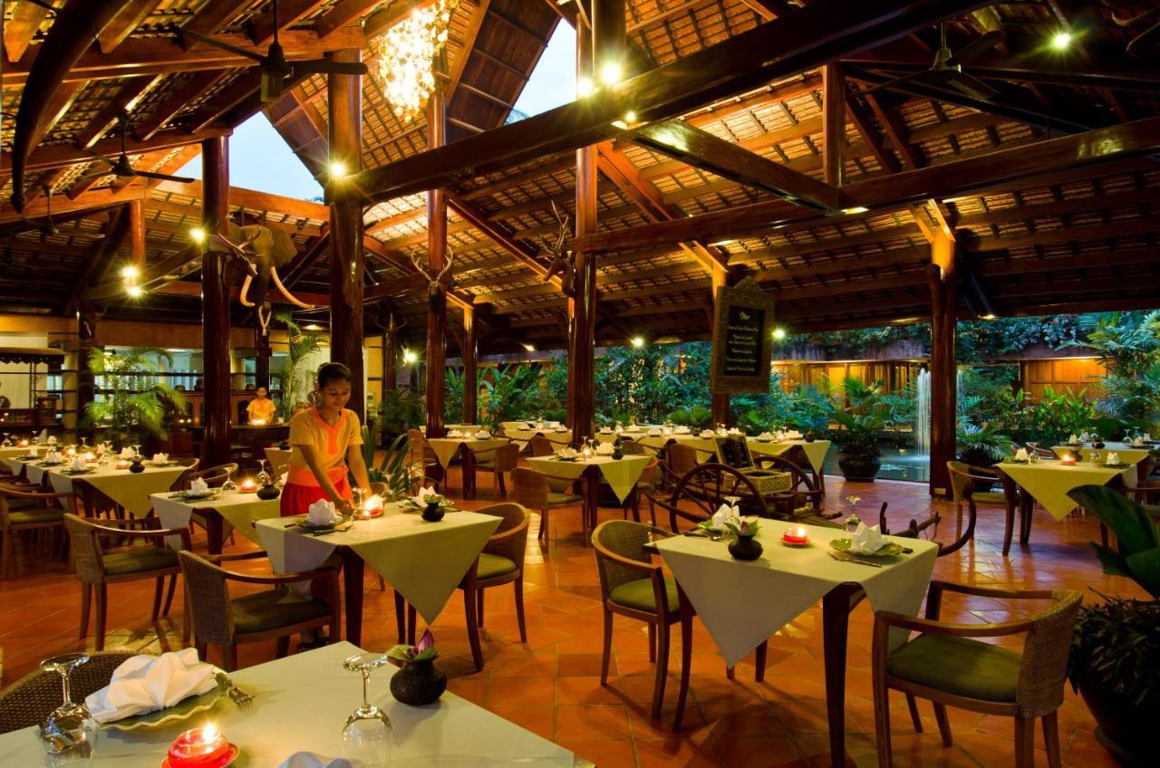 Angkor Village Hotel - Small Luxury Hotels Of The World Siem Reap Exteriér fotografie The restaurant at the resort